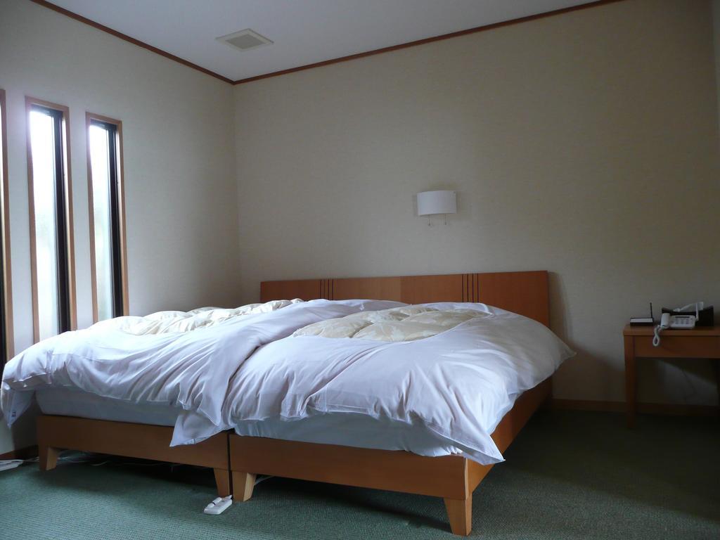 Donkairo Hotell Ako Rum bild